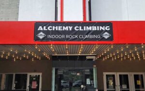 front exterior of retro theater with sign at alchemy climbing tallahassee