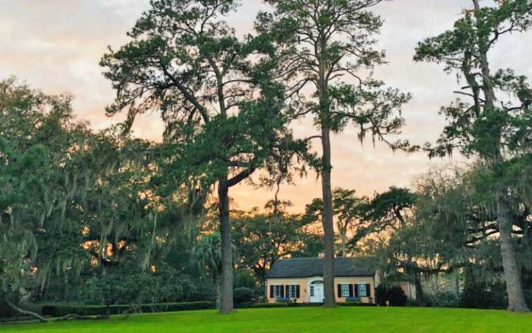 house with wooded background and sunset sky at alfred b maclay gardens state park tallahassee