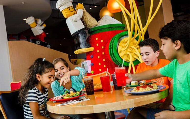kids dining at restaurant with lego decor at legoland hotel winter haven