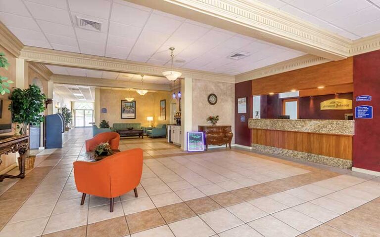 lobby with front desk at howard johnson by wyndham lakeland