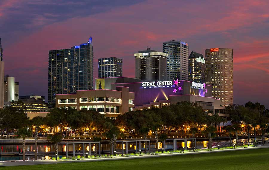 night skyline with lights of buildings along tampa riverwalk straz center for the performing arts