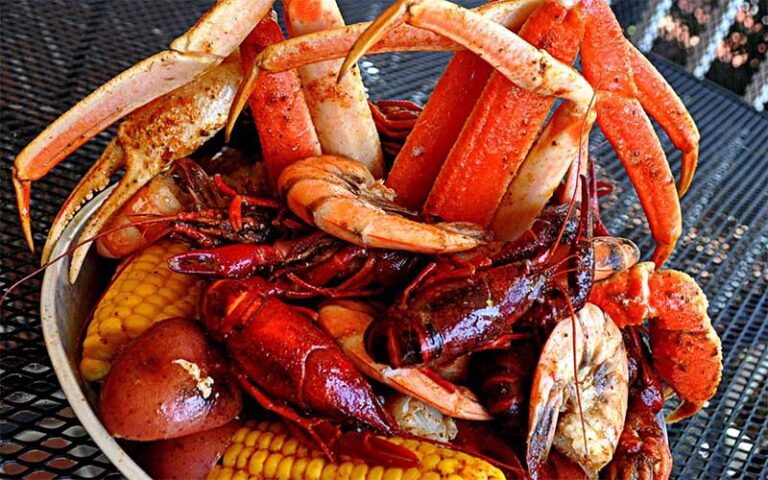 seafood boil bowl with crab legs crawfish shrimp and veg at wahoo seafood grill tallahassee