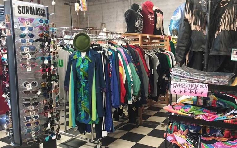 shop interior with clothing racks and sunglasses at the other side vintage tallahassee