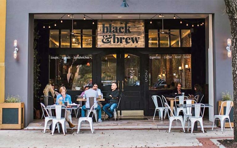 sidewalk view of cafe with patio seating at black brew lakeland