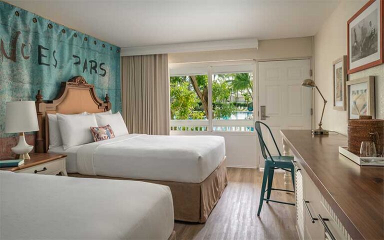 stylish double bed suite with decor at havana cabana key west