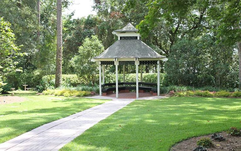 white gazebo in garden area at dorothy b oven park tallahassee