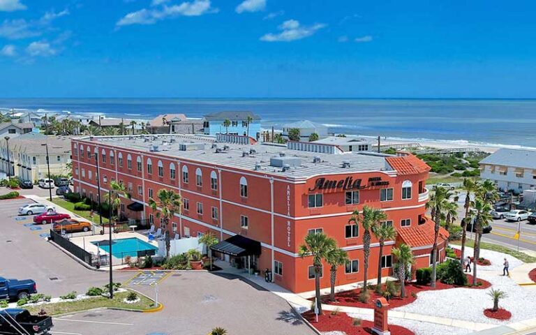 aerial of three story hotel building with beach in background at amelia hotel at the beach fernandina beach amelia island