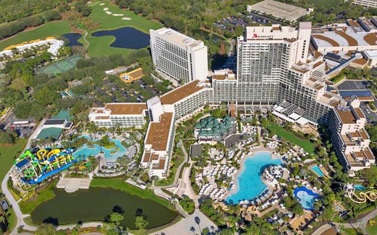 aerial view of resort with horseshoe shaped building and pools at orlando world center marriott