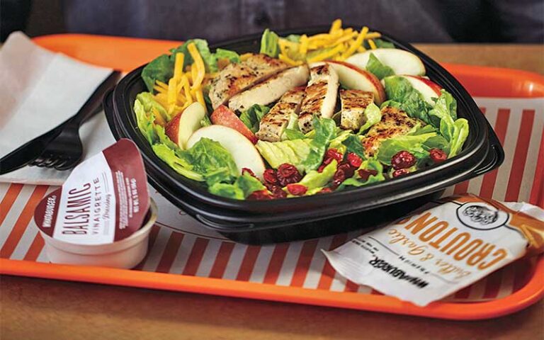 apple chicken salad with dressing on orange tray at whataburger west pensacola