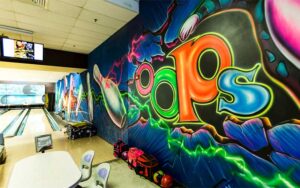 bowling alley with mural at oops alley family entertainment center pensacola