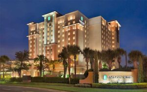 exterior of high rise hotel at night at embassy suites by hilton orlando lake buena vista south kissimmee
