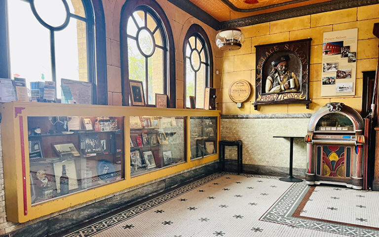 foyer of bar with tiled floor and arched windows at palace saloon fernandina beach amelia island