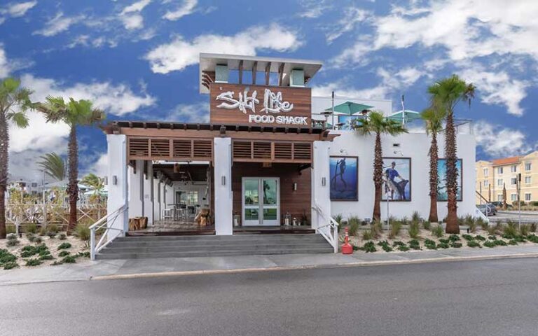 front exterior of restaurant with cloudy sky at salt life food shack fernandina beach