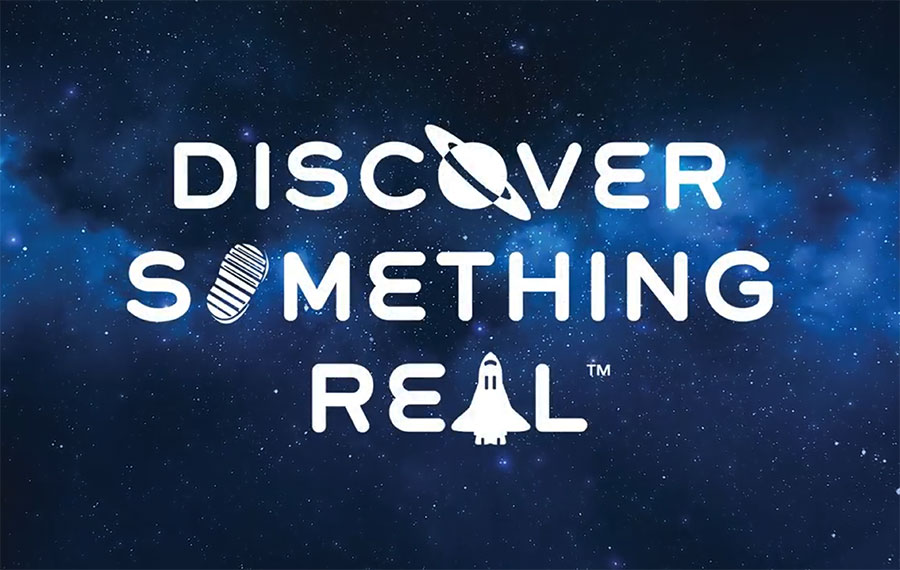 graphic with discover something real logo on space background for kennedy space center visitor complex