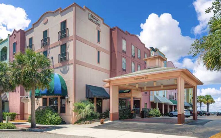 hotel exterior from corner with parking at hampton inn suites amelia island historic harbor front fernandina beach