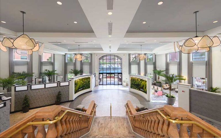 hotel lobby with atrium and staircase at caribe royale orlando