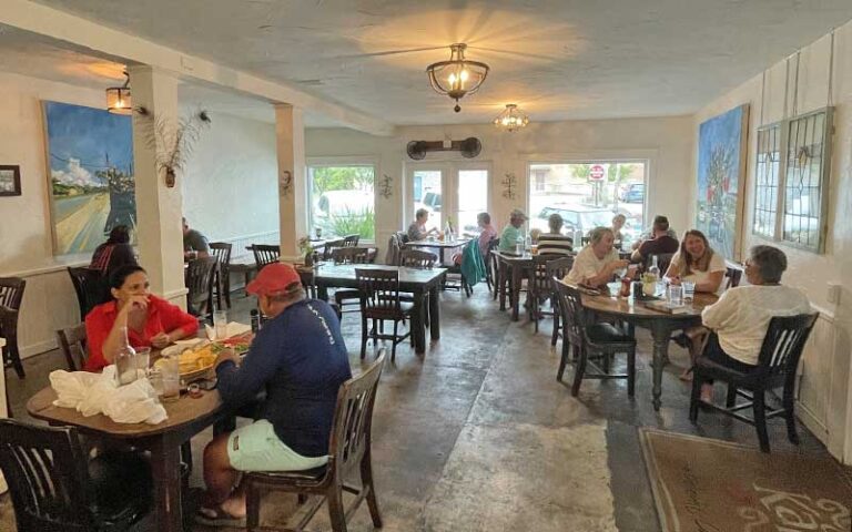 interior of restaurant with diners at tables at cafe karibo fernandina beach amelia island