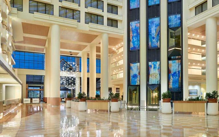 lobby with atrium and vault ceiling and chandeliers at orlando world center marriott