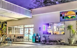 night exterior of gas station restaurant with sign at t rays burger station fernandina beach amelia island