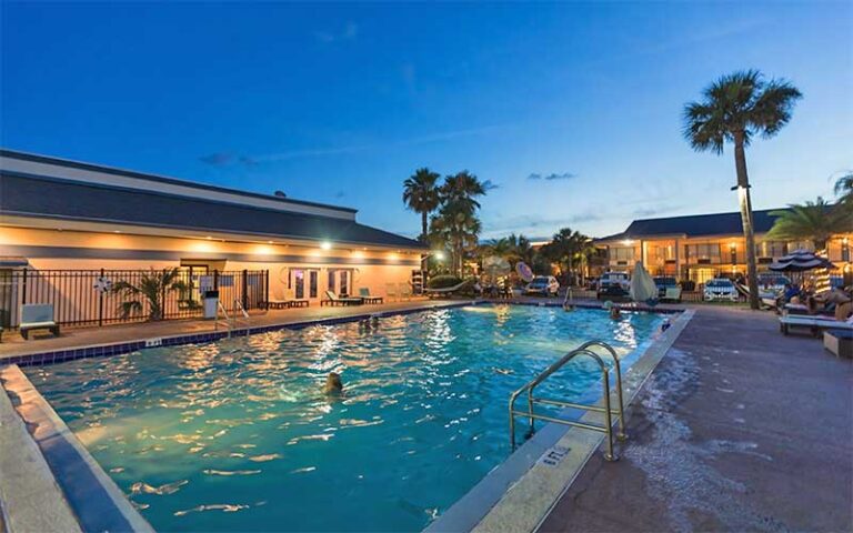 night view of lighted swimming pool at ocean coast hotel at the beach amelia island