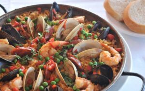 paella with clams and mussels on table at espana restaurant tapas fernandina beach amelia island