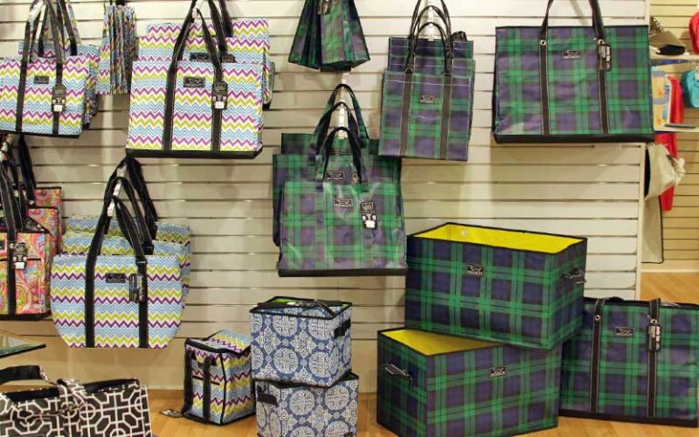 plaid canvas beach bags on display at palmetto walk shopping village amelia island