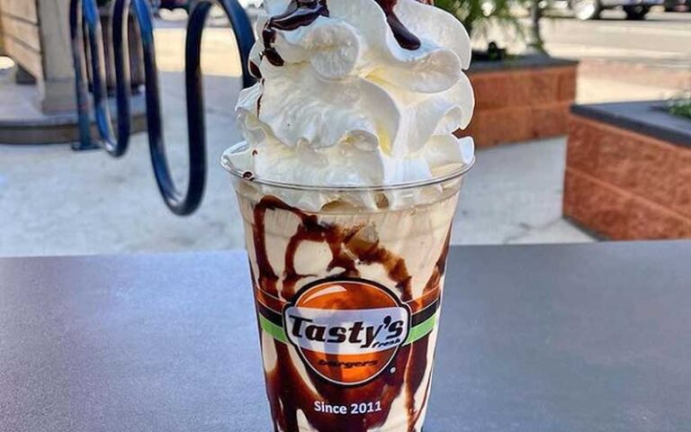 shake with whipped ripple topping on patio table at tastys fresh burgers fernandina beach