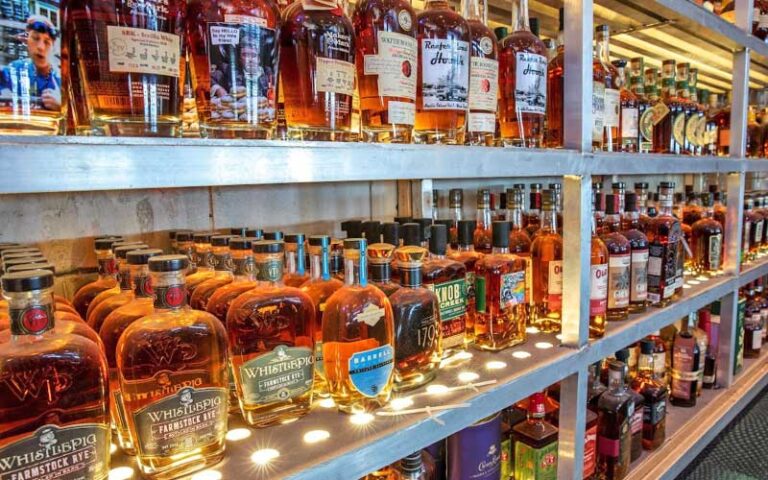 shelves of bourbon bottles at sandbar amelia island fernandina beach