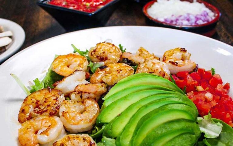 shrimp scampi with avocado and salad at peppers cocina mexicana tequila bar fernandina beach