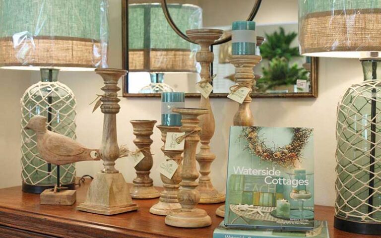 sideboard with wooden lamps and candlesticks at palmetto walk shopping village amelia island