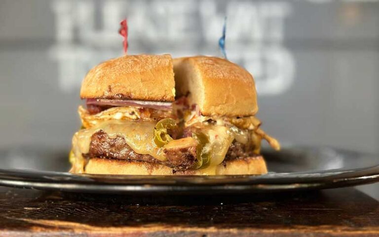 signature burger with onions at midtown caboose tallahassee