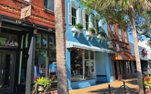 street view of sidewalk with blue shop at the book loft fernandina beach amelia island