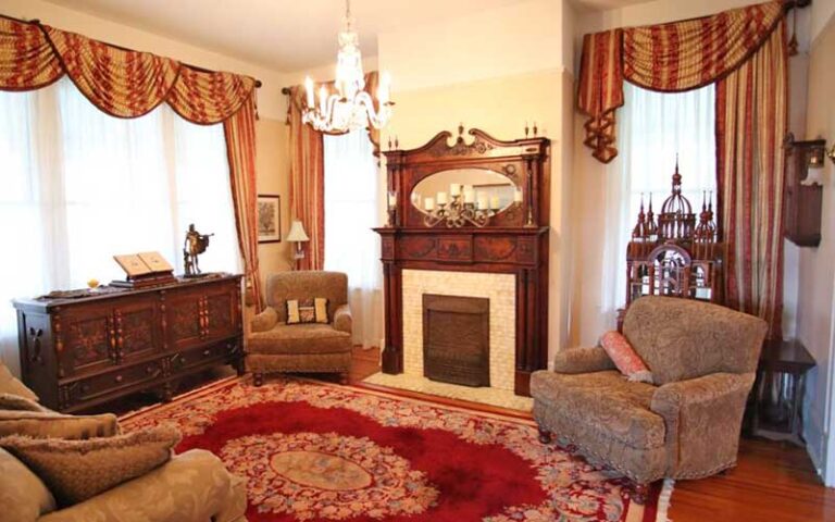 victorian style living room with fireplace at hoyt house bed breakfast fernandina beach amelia island