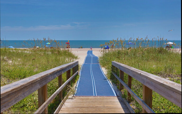 view from boardwalk of beach access with ada pathway at main beach park fernandina amelia island