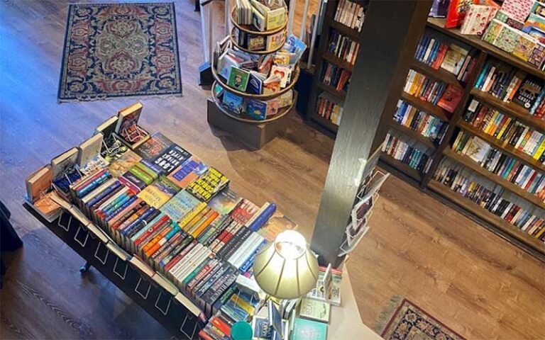 view looking down from loft of book shelves and lamp at the book loft fernandina beach amelia island