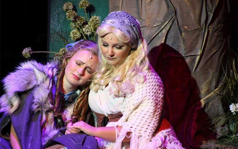 actresses performing on stage at pensacola little theatre