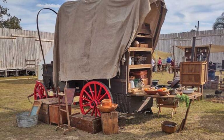 covered peddlers wagon with supplies at fort king national historic landmark ocala