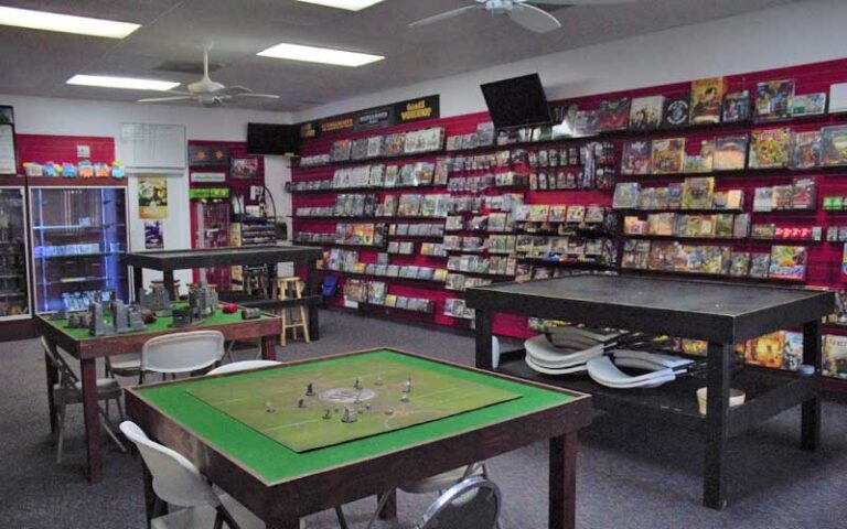 game room with playing tables at bearded browncoat comics games ocala