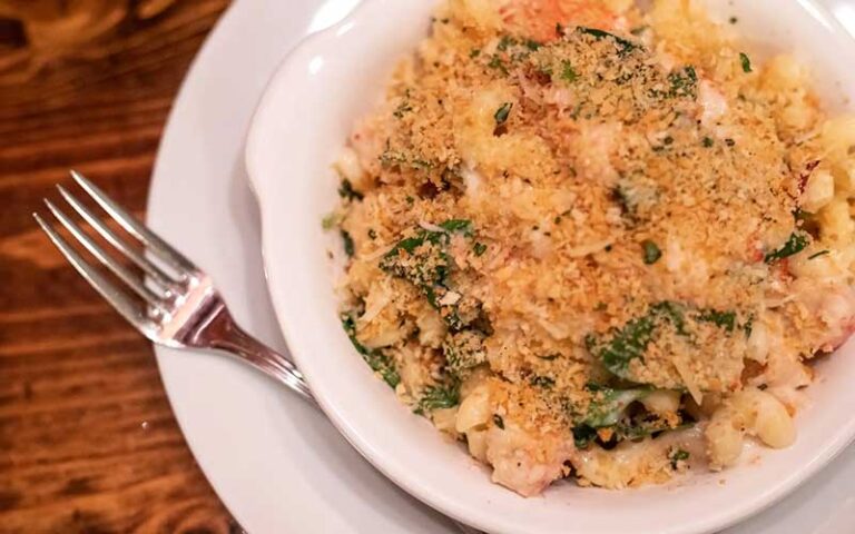 lobster mac n cheese entree with fork at braised onion ocala