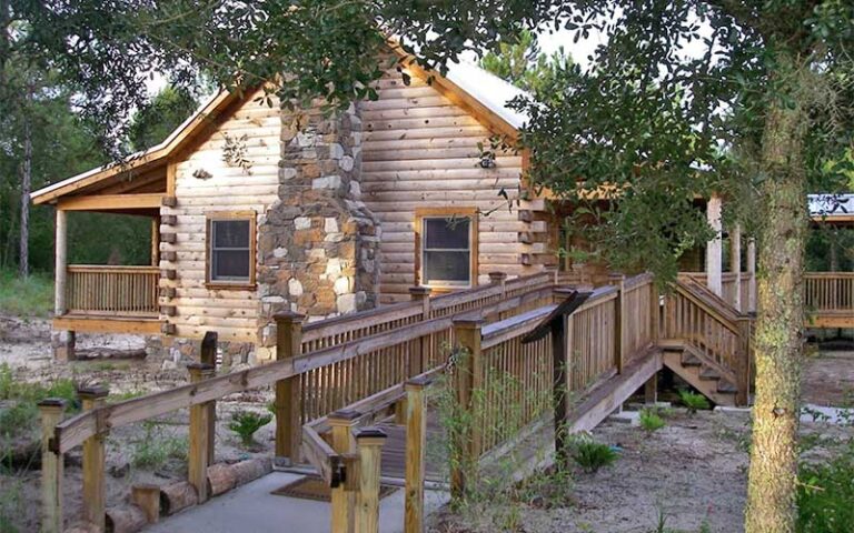 log cabin with stone chimney museum and discovery center at oakland nature preserve winter garden orlando