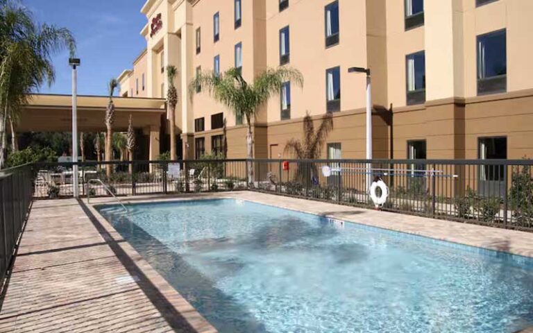 outdoor swimming pool area at hampton inn suites ocala belleview