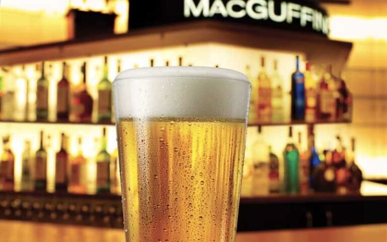 pint of beer with macguffin bar sign at amc bayou 15 pensacola