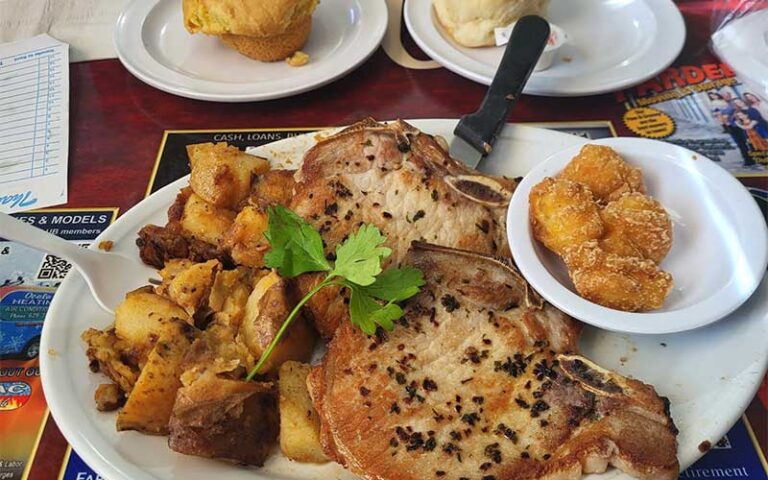 pork chops with sides at wolfys restaurant ocala