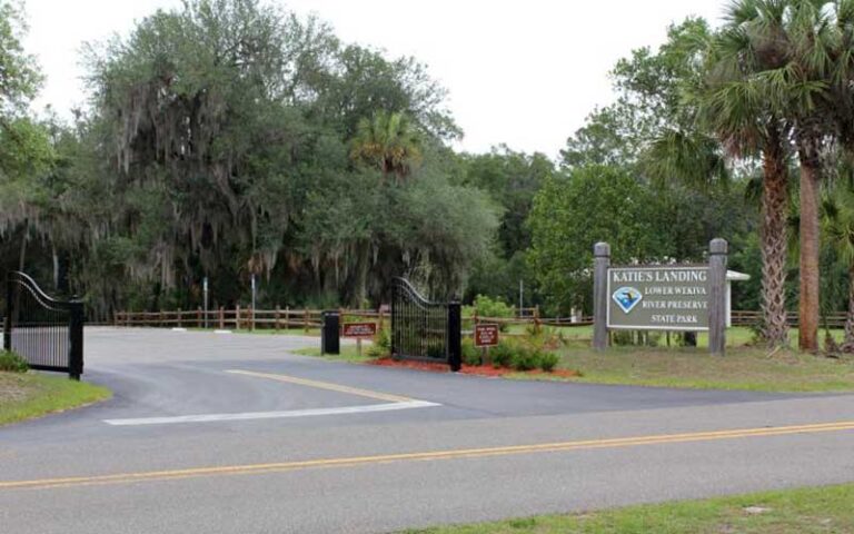 roadside gate entrance with sign katies landing at little wekiva river preserve state park sanford