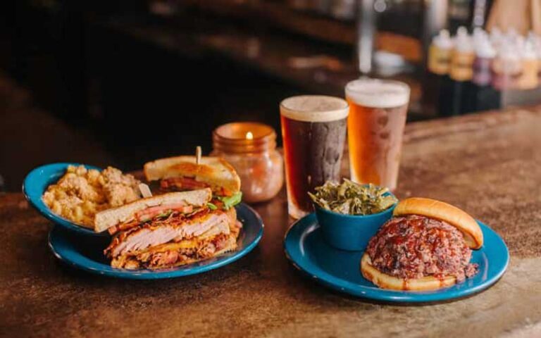 sandwiches beer and sides on bartop at brick city southern kitchen ocala