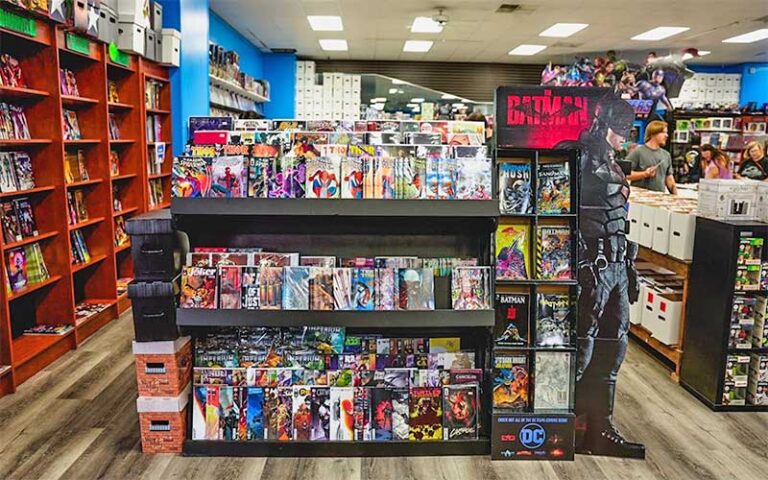 shelves of comic books and batman display store interior at bearded browncoat comics games ocala