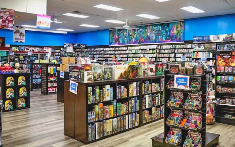 store interior with shelves of comics and collectors figures at bearded browncoat comics games ocala