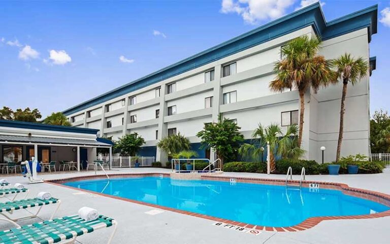 swimming pool area with hotel at best western ocala park centre