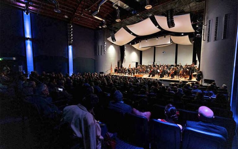 theater stage with symphony on stage and crowd at reilly arts center ocala