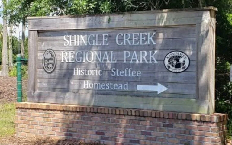 wooden park sign at entrance at shingle creek regional park steffee landing kissimmee